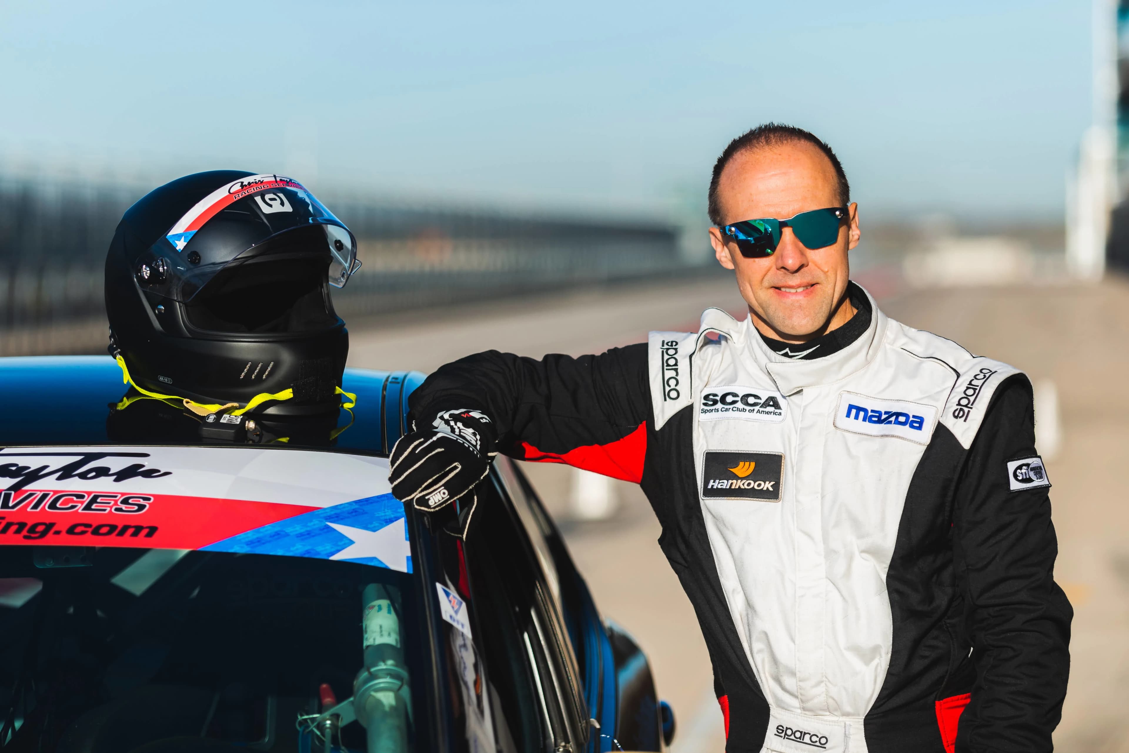 Carey Rouse with racecar