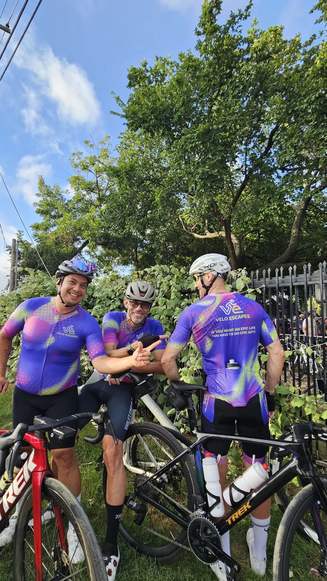 Riders in Velo Escapes kit after a group ride